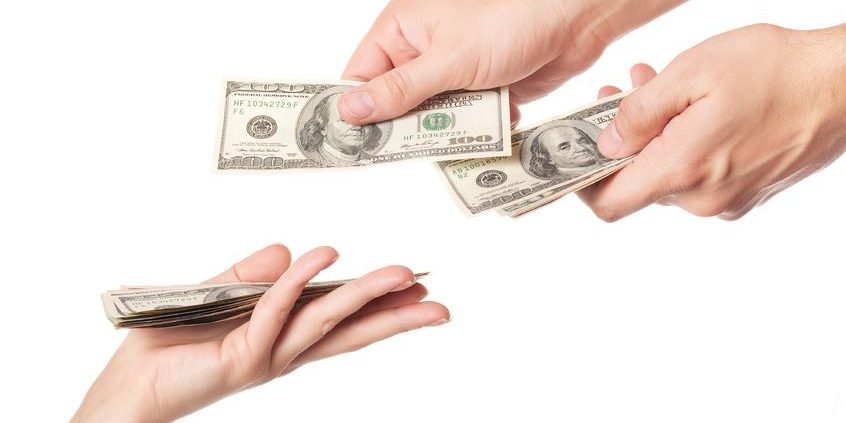 10767978 – hands giving money isolated on white background stock market distribution