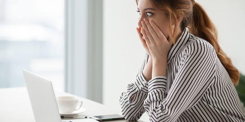 Businesswoman rounding eyes shocked with company market crash scared trader | trading fears