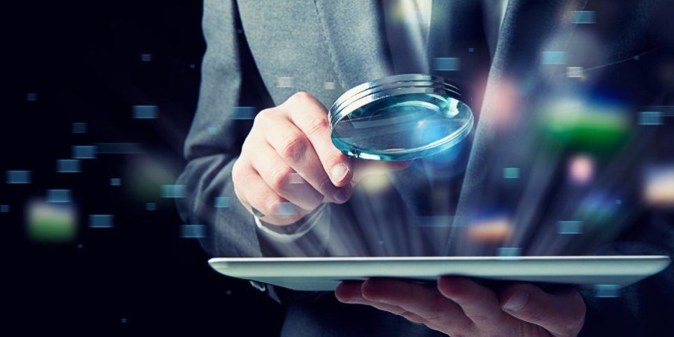 108919450_s businessman looking at tablet through magnifying glass | hedge funds