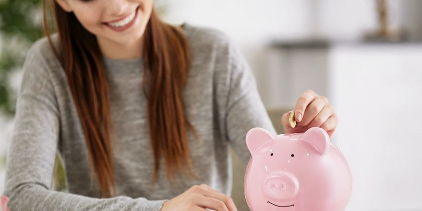 putting money in piggy bank | selling strategies