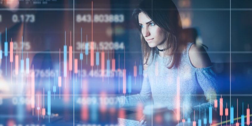 122592844_s young woman trading | analyzing stock charts