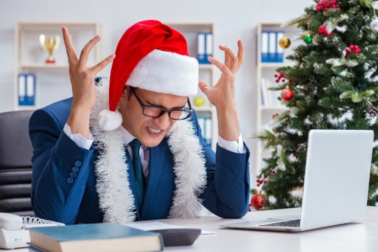 business person in Santa hat | seasonal trends