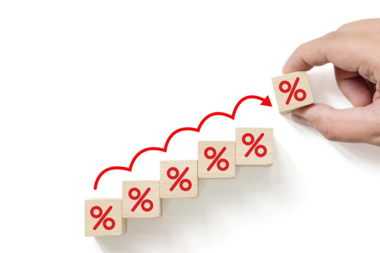 stack of blocks showing interest rate hikes
