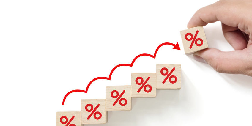 stack of blocks showing interest rate hikes
