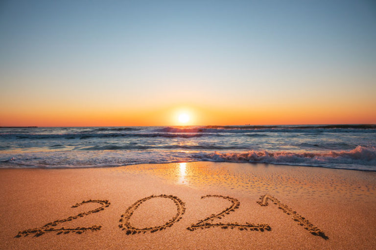 new market year | 2021 written on a beach