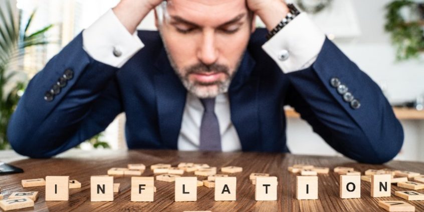182005754_s businessman staring down inflation | the Fed's rate hikes