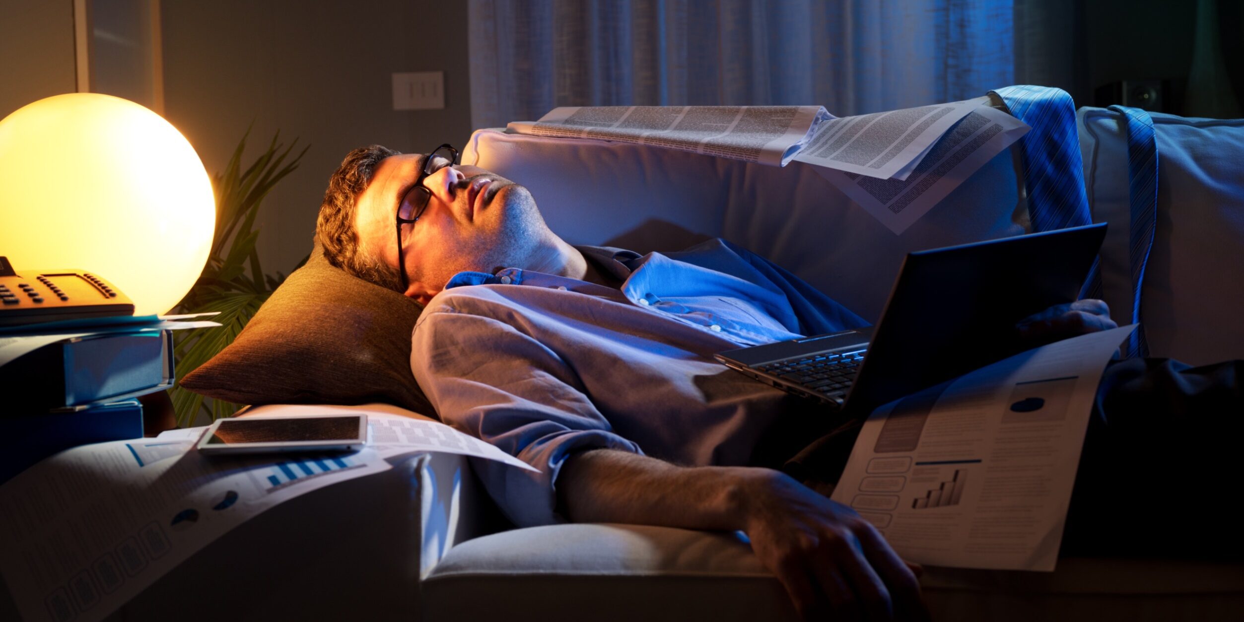 tired trader sleeping on couch | put protection strategy