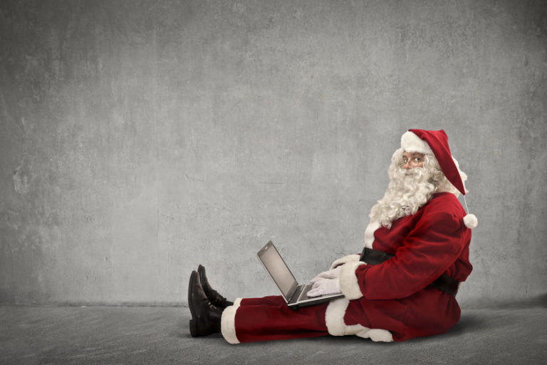 Santa trading on his laptop | Santa Claus rally