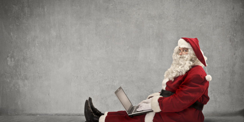 Santa trading on his laptop | Santa Claus rally