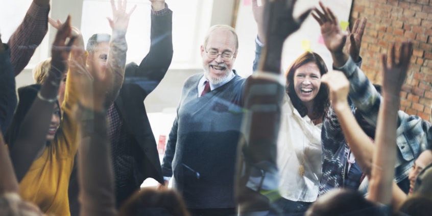 Team Huddle Harmony Togetherness Happiness Concept make money trading options | group of business people celebrating