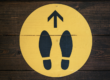 foot prints and arrow pointing the way | market trend is changing