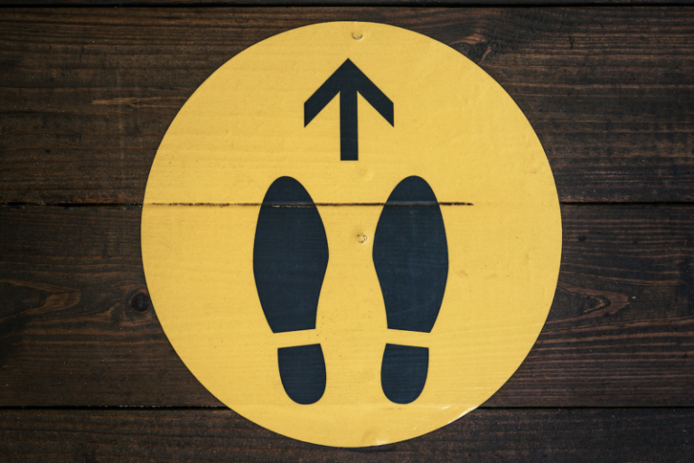 foot prints and arrow pointing the way | market trend is changing