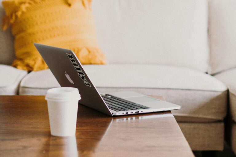 laptop, coffee cup, and empty couch | low volatility before a holiday weekend