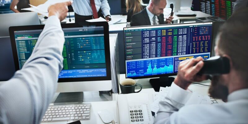 stock traders in office | adjust your trading strategy for fall 2026