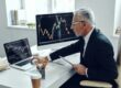 trader looking at bearish chart | buying the dip right now