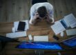 worried trader holding head | low vix reading