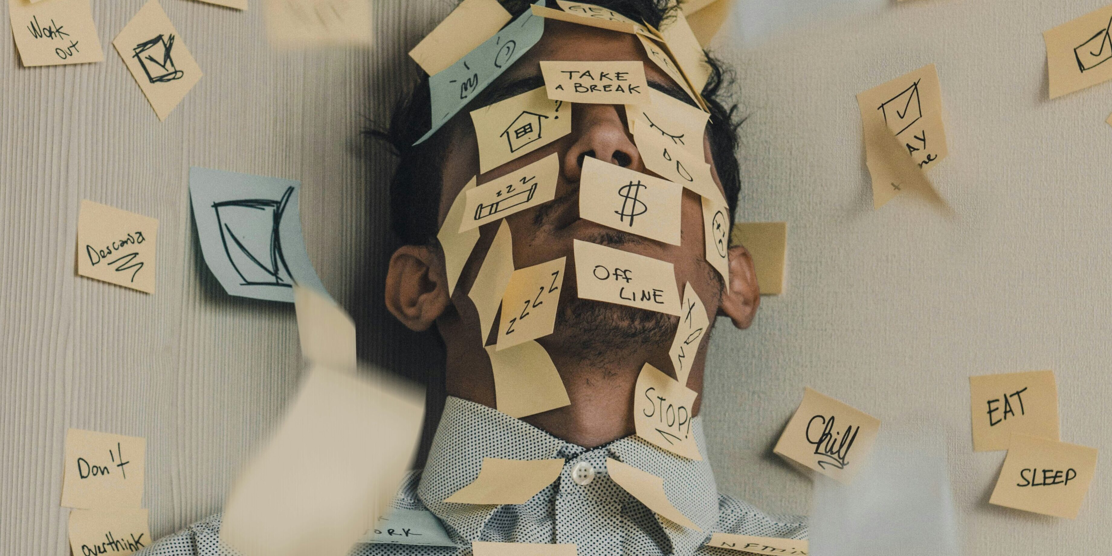 bored trader covered in sticky notes | trading is boring