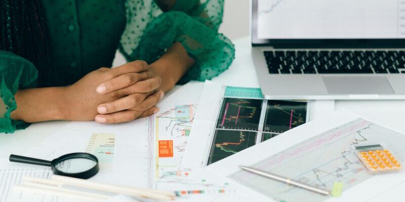 pexels-n-voitkevich-7172830 woman studying charts | trading tips