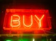 neon "buy" sign | buying the dip